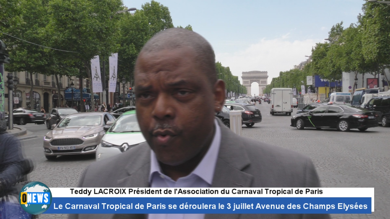 [Vidéo]Le carnaval tropical de Paris du 3 juillet Avenue des Champs Elysées . Teddy LACROIX Président de l association mécontent pour un problème de barrières.