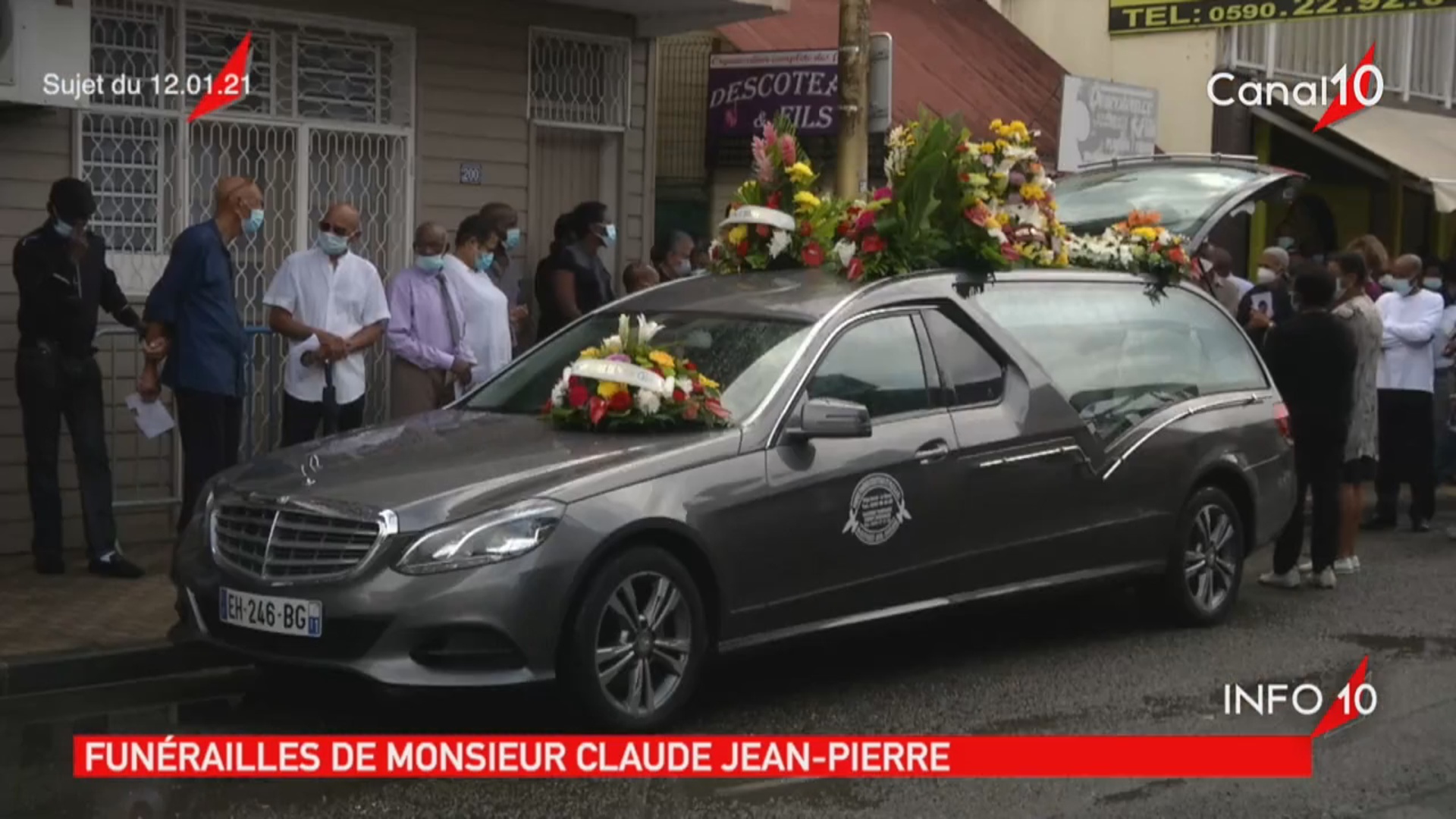 Onews Guadeloupe. Le Jt de Canal 10. a la une les funérailles de Claude JEAN PIERRE à Deshaies.